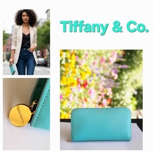 This is a Tiffany & Co. long zip-around leather wallet